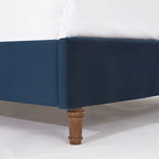 Cama King tapizada con cabecero orejero capitoné