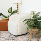 Mid-Century Modern draaistoel met bouclé bekleding