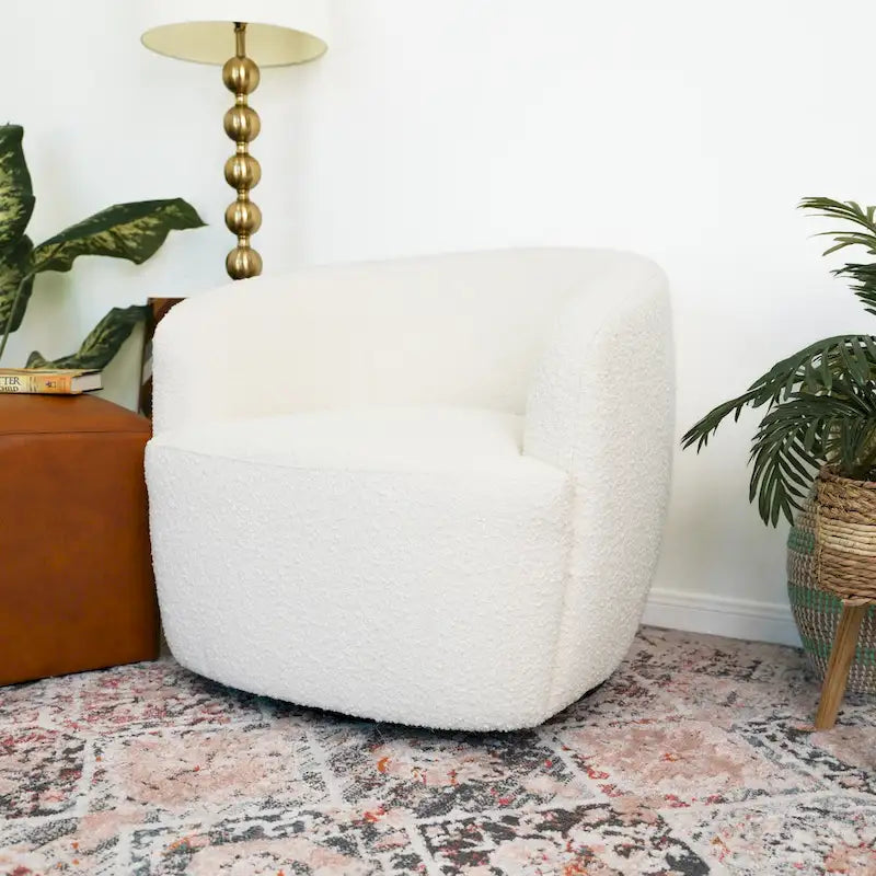 Sillón giratorio tapizado en bouclé estilo mediados de siglo