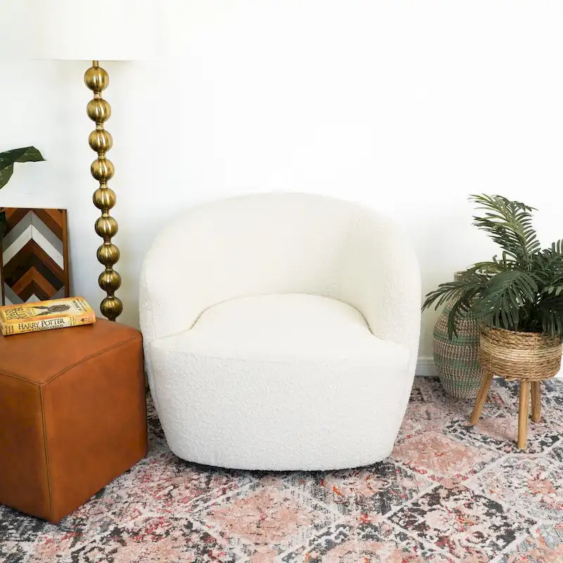 Sillón giratorio tapizado en bouclé estilo mediados de siglo