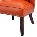 Silla decorativa sin brazos de piel sintética naranja con ribete de tachuelas
